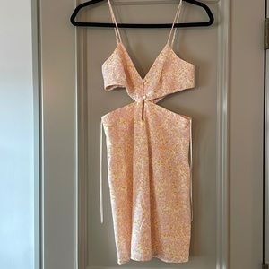 Cute Zara floral dress with side cutouts. Brand new never worn